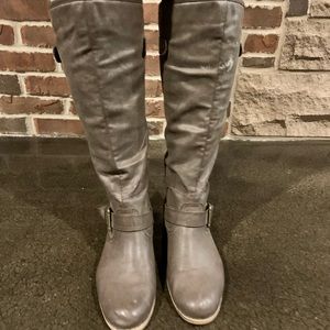 Women’s blowfish knee high boots.